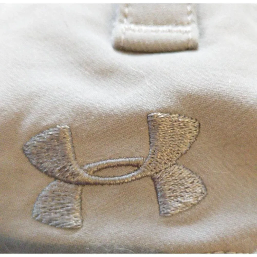 Under Armour Gray loose shorts size 34. They're made with a lightweight, highly